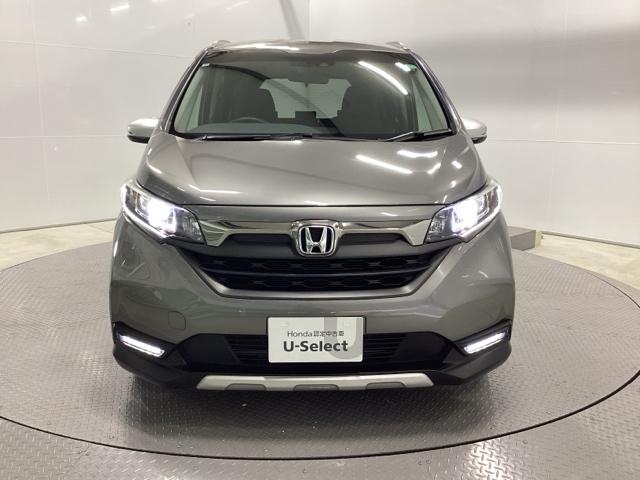 フリード+ハイブリッド ハイブリッド・クロスターホンダセンシング 両側電動スライドドア クルコン バックカメラ 純正ナビ フルセグ ETC シートヒーター 両側電動ドア サイドエアバッグ LEDヘッドライト スマートキー 横滑り防止装置 クルーズコントロール USB(6枚目)