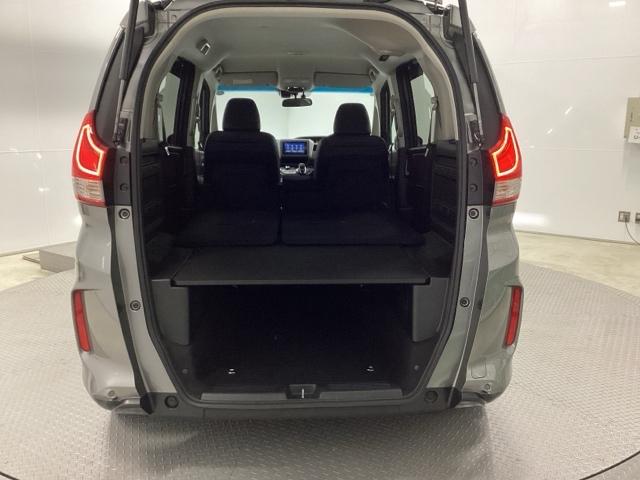 フリード+ハイブリッド ハイブリッド・クロスターホンダセンシング 両側電動スライドドア クルコン バックカメラ 純正ナビ フルセグ ETC シートヒーター 両側電動ドア サイドエアバッグ LEDヘッドライト スマートキー 横滑り防止装置 クルーズコントロール USB(24枚目)