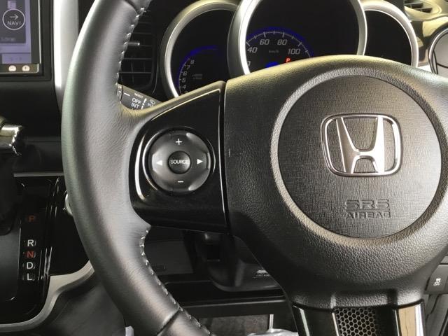 N-BOXカスタム GSSパッケージ 両側電動スライドドア 社外ナビ フルセグ 両側パワ-スライドドア TVナビ スマ-トキ- ETC付き エアコン ESC A-STOP 盗難防止システム パワーウィンドウ 運転席助手席エアバッグ DVD(17枚目)