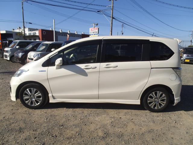 フリードハイブリッド ジャストセレクション　純正ナビ　フルセグＴＶ　Ｂｌｕｅｔｏｏｔｈオーディオ　スマートキー　両側パワースライドドア　クルーズコントロール　オートライト　ディスチャージヘッドライト　ＥＴＣ（7枚目）