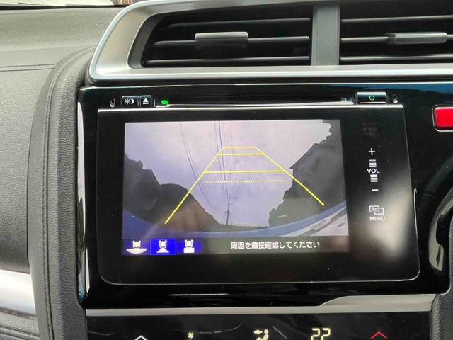 フィットハイブリッド Ｌパッケージ　ハイブリッド　ＥＴＣ　バックカメラ　ナビ　ＴＶ　オートクルーズコントロール　オートライト　ＬＥＤヘッドランプ　スマートキー　電動格納ミラー　ＡＴ　盗難防止システム　衝突安全ボディ　アルミホイール　ＣＤ（5枚目）