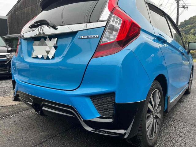 フィットハイブリッド Ｌパッケージ　ハイブリッド　ＥＴＣ　バックカメラ　ナビ　ＴＶ　オートクルーズコントロール　オートライト　ＬＥＤヘッドランプ　スマートキー　電動格納ミラー　ＡＴ　盗難防止システム　衝突安全ボディ　アルミホイール　ＣＤ（18枚目）