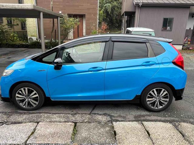 フィットハイブリッド Ｌパッケージ　ハイブリッド　ＥＴＣ　バックカメラ　ナビ　ＴＶ　オートクルーズコントロール　オートライト　ＬＥＤヘッドランプ　スマートキー　電動格納ミラー　ＡＴ　盗難防止システム　衝突安全ボディ　アルミホイール　ＣＤ（20枚目）