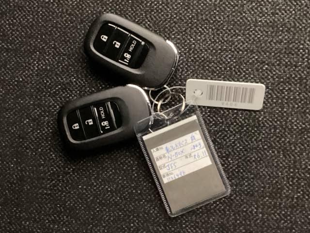 N-BOXカスタム ベースグレード 試乗車 禁煙車 メモリーナビ フルセグ リアカメラ CMBS Dレコ ベンチシート オートエアコン スマートキ LED 盗難防止装置 クルコン バックカメラ パワーステアリング エアバッグ ESC(20枚目)