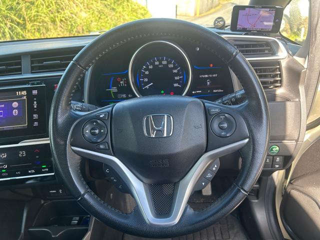 フィットハイブリッド Ｌパッケージ　ハイブリッド　ドライブレコーダー　ＥＴＣ　バックカメラ　ナビ　ＴＶ　エアロ　オートクルーズコントロール　オートライト　ＬＥＤヘッドランプ　スマートキー　電動格納ミラー　ＡＴ　盗難防止システム（3枚目）