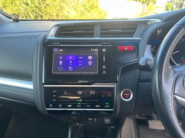 フィットハイブリッド Ｌパッケージ　ハイブリッド　ドライブレコーダー　ＥＴＣ　バックカメラ　ナビ　ＴＶ　エアロ　オートクルーズコントロール　オートライト　ＬＥＤヘッドランプ　スマートキー　電動格納ミラー　ＡＴ　盗難防止システム（7枚目）