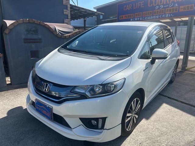 フィットハイブリッド Ｌパッケージ　ハイブリッド　ドライブレコーダー　ＥＴＣ　バックカメラ　ナビ　ＴＶ　エアロ　オートクルーズコントロール　オートライト　ＬＥＤヘッドランプ　スマートキー　電動格納ミラー　ＡＴ　盗難防止システム（12枚目）