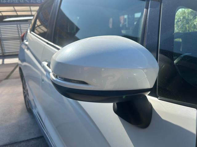 フィットハイブリッド Ｌパッケージ　ハイブリッド　ドライブレコーダー　ＥＴＣ　バックカメラ　ナビ　ＴＶ　エアロ　オートクルーズコントロール　オートライト　ＬＥＤヘッドランプ　スマートキー　電動格納ミラー　ＡＴ　盗難防止システム（63枚目）