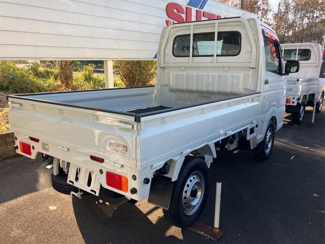 キャリイトラック ＫＣ　４ＷＤ　軽トラック　ＭＴ　クリアランスソナー　アイドリングストップ　オートライト　ＥＳＣ　エアコン　パワーステアリング　パワーウィンドウ　運転席エアバッグ　助手席エアバッグ　記録簿　助手席エアバック（11枚目）