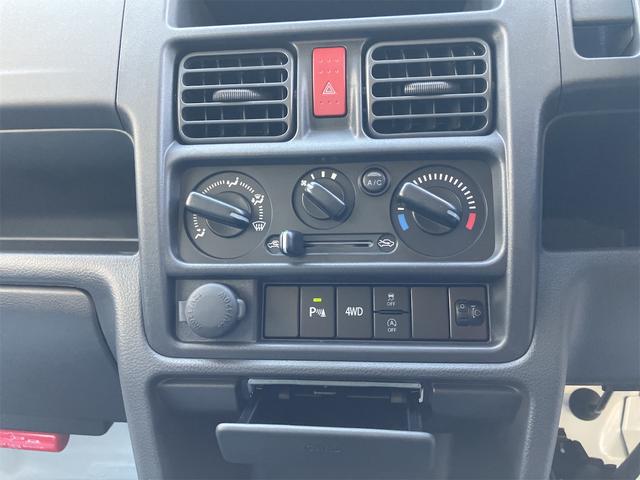 キャリイトラック ＫＣ　４ＷＤ　軽トラック　ＭＴ　クリアランスソナー　アイドリングストップ　オートライト　ＥＳＣ　エアコン　パワーステアリング　パワーウィンドウ　運転席エアバッグ　助手席エアバッグ　記録簿　助手席エアバック（38枚目）