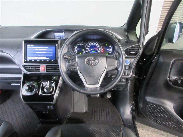 ヴォクシー ハイブリッドZS 煌III ドライブレコーダ 地デジTV リヤカメラ スマートキー DVD再生可 クルコン VSC キーレス アルミホイール ナビ&TV LEDヘッドランプ ETC 3列シート 記録簿 ハーフレザーシート ABS(3枚目)