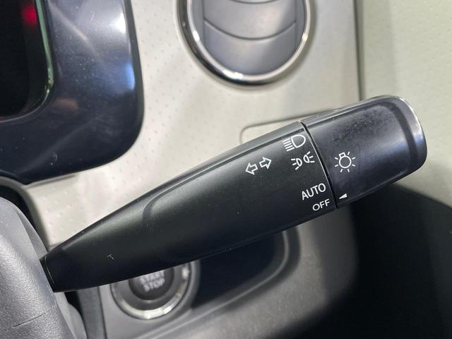 ＭＲワゴン １０ｔｈアニバーサリー　リミテッド　禁煙車　スマートキー　ＨＩＤヘッド　ＥＴＣ　オートライト　オートエアコン　純正１４インチアルミ　ＣＤ再生　革巻きステアリング　ステアリングスイッチ　横滑防止装置　電動格納ミラー　後席格納（5枚目）