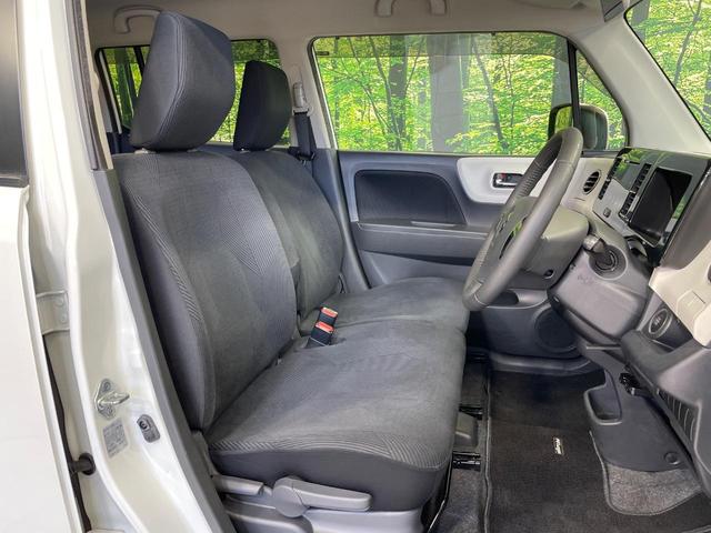 ＭＲワゴン １０ｔｈアニバーサリー　リミテッド　禁煙車　スマートキー　ＨＩＤヘッド　ＥＴＣ　オートライト　オートエアコン　純正１４インチアルミ　ＣＤ再生　革巻きステアリング　ステアリングスイッチ　横滑防止装置　電動格納ミラー　後席格納（8枚目）