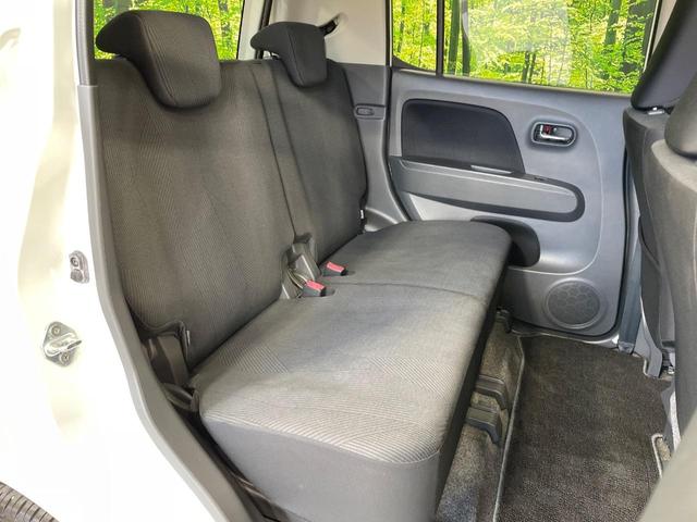 ＭＲワゴン １０ｔｈアニバーサリー　リミテッド　禁煙車　スマートキー　ＨＩＤヘッド　ＥＴＣ　オートライト　オートエアコン　純正１４インチアルミ　ＣＤ再生　革巻きステアリング　ステアリングスイッチ　横滑防止装置　電動格納ミラー　後席格納（9枚目）