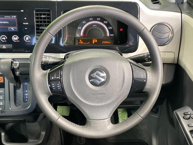 ＭＲワゴン １０ｔｈアニバーサリー　リミテッド　禁煙車　スマートキー　ＨＩＤヘッド　ＥＴＣ　オートライト　オートエアコン　純正１４インチアルミ　ＣＤ再生　革巻きステアリング　ステアリングスイッチ　横滑防止装置　電動格納ミラー　後席格納（11枚目）