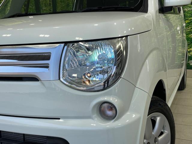 ＭＲワゴン １０ｔｈアニバーサリー　リミテッド　禁煙車　スマートキー　ＨＩＤヘッド　ＥＴＣ　オートライト　オートエアコン　純正１４インチアルミ　ＣＤ再生　革巻きステアリング　ステアリングスイッチ　横滑防止装置　電動格納ミラー　後席格納（12枚目）