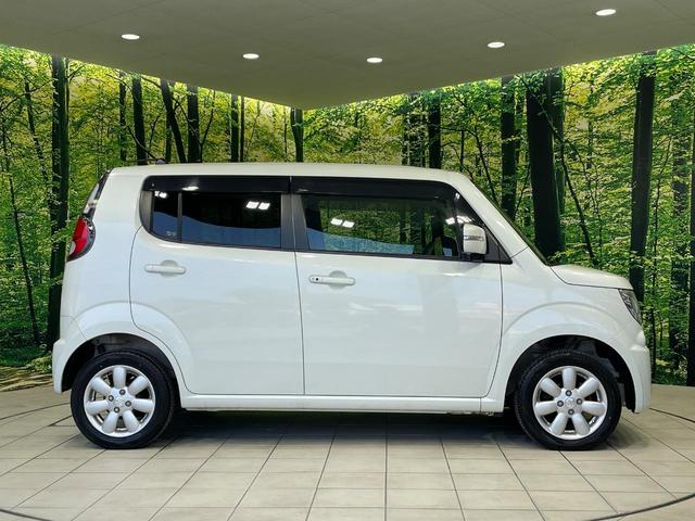 ＭＲワゴン １０ｔｈアニバーサリー　リミテッド　禁煙車　スマートキー　ＨＩＤヘッド　ＥＴＣ　オートライト　オートエアコン　純正１４インチアルミ　ＣＤ再生　革巻きステアリング　ステアリングスイッチ　横滑防止装置　電動格納ミラー　後席格納（27枚目）