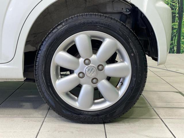 ＭＲワゴン １０ｔｈアニバーサリー　リミテッド　禁煙車　スマートキー　ＨＩＤヘッド　ＥＴＣ　オートライト　オートエアコン　純正１４インチアルミ　ＣＤ再生　革巻きステアリング　ステアリングスイッチ　横滑防止装置　電動格納ミラー　後席格納（29枚目）