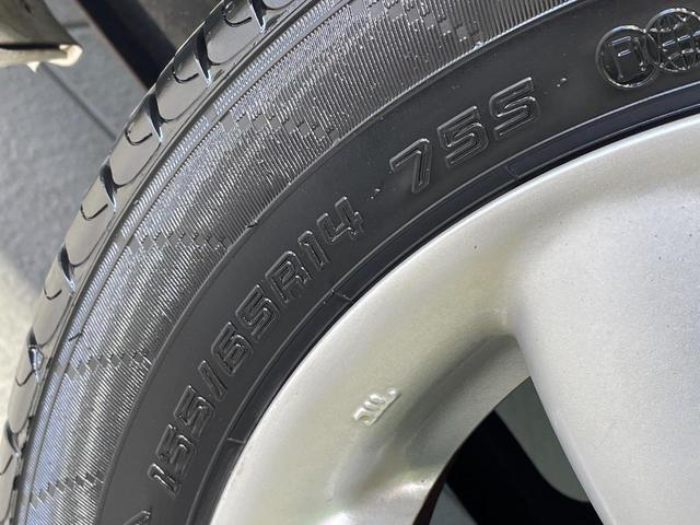ＭＲワゴン １０ｔｈアニバーサリー　リミテッド　禁煙車　スマートキー　ＨＩＤヘッド　ＥＴＣ　オートライト　オートエアコン　純正１４インチアルミ　ＣＤ再生　革巻きステアリング　ステアリングスイッチ　横滑防止装置　電動格納ミラー　後席格納（30枚目）