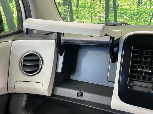 ＭＲワゴン １０ｔｈアニバーサリー　リミテッド　禁煙車　スマートキー　ＨＩＤヘッド　ＥＴＣ　オートライト　オートエアコン　純正１４インチアルミ　ＣＤ再生　革巻きステアリング　ステアリングスイッチ　横滑防止装置　電動格納ミラー　後席格納（42枚目）