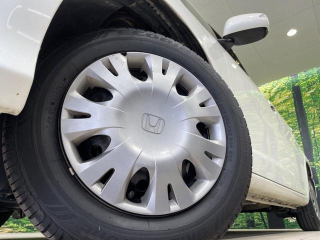 フィット G・10thアニバーサリー 純正SDナビ 禁煙車 スマートキー LEDヘッド オートライト CD DVD再生 地デジ(13枚目)