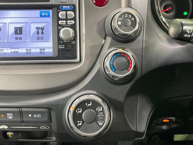 フィット G・10thアニバーサリー 純正SDナビ 禁煙車 スマートキー LEDヘッド オートライト CD DVD再生 地デジ(35枚目)