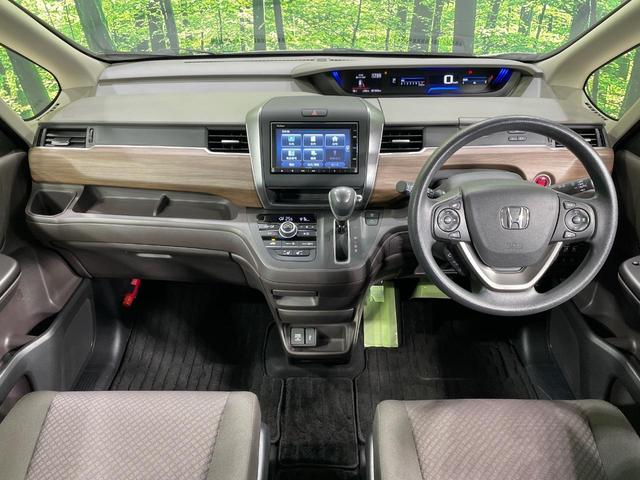 フリード G 純正ナビ 両側電動ドア バックカメラ 衝突軽減装置 レーダークルーズ 禁煙車 ドラレコ コーナーセンサー スマートキー LEDヘッド ビルトインETC 車線逸脱警報 オートライト オートエアコン(2枚目)