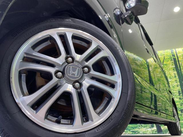 Ｎ－ＢＯＸカスタム Ｇ・Ｌパッケージ　電動スライドドア　純正ナビ　バックカメラ　禁煙車　スマートキー　ＨＩＤヘッド　ＥＴＣ　オートライト　オートエアコン　純正１４インチアルミ　Ｂｌｕｅｔｏｏｔｈ　ＣＤ　ＤＶＤ再生　フルセグ　フォグライト（13枚目）