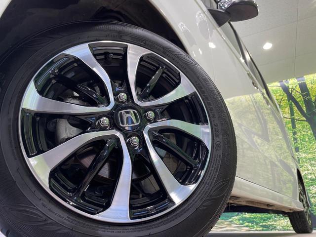 N-BOXカスタム コーディネートスタイル 両側電動ドア 純正8インチナビ バックカメラ 衝突被害軽減システム レーダークルーズ 禁煙車 ハーフレザーシート ドラレコ コーナーセンサー スマートキー LEDヘッド 車線逸脱警報 オートライト(13枚目)