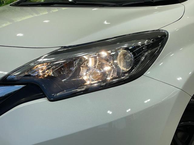 ノート ｅ－パワー　Ｘ　純正ＳＤナビ　全周囲カメラ　衝突被害軽減システム　禁煙車　ドラレコ　コーナーセンサー　スマートキー　ＥＴＣ　車線逸脱警報　オートライト　オートエアコン　純正オプション１４インチＡＷ　Ｂｌｕｅｔｏｏｔｈ（12枚目）