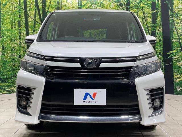 ヴォクシー ＺＳ　両側電動ドア　純正ナビ　フリップダウンモニター　バックカメラ　禁煙車　ドラレコ　スマートキー　ＬＥＤヘッド　ＥＴＣ　オートライト　デュアルエアコン　純正１６インチアルミ　Ｂｌｕｅｔｏｏｔｈ　ＤＶＤ再生（14枚目）