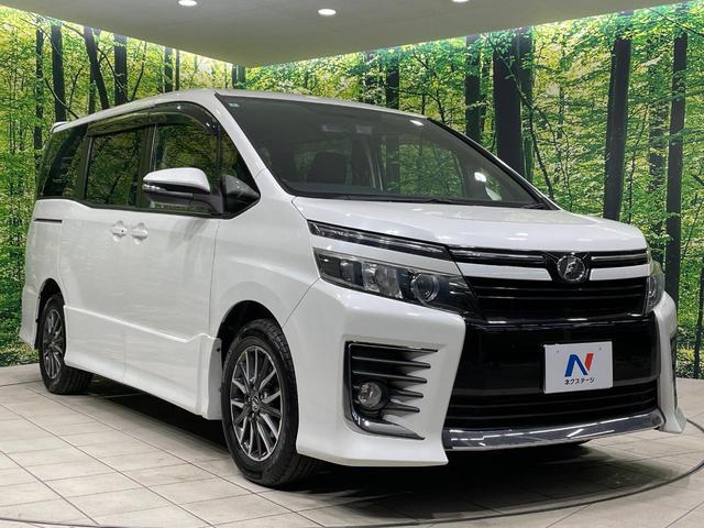 ヴォクシー ＺＳ　両側電動ドア　純正ナビ　フリップダウンモニター　バックカメラ　禁煙車　ドラレコ　スマートキー　ＬＥＤヘッド　ＥＴＣ　オートライト　デュアルエアコン　純正１６インチアルミ　Ｂｌｕｅｔｏｏｔｈ　ＤＶＤ再生（16枚目）