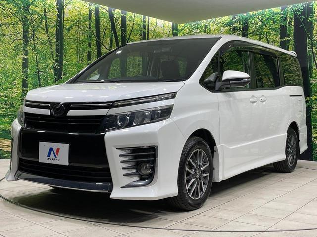 ヴォクシー ＺＳ　両側電動ドア　純正ナビ　フリップダウンモニター　バックカメラ　禁煙車　ドラレコ　スマートキー　ＬＥＤヘッド　ＥＴＣ　オートライト　デュアルエアコン　純正１６インチアルミ　Ｂｌｕｅｔｏｏｔｈ　ＤＶＤ再生（24枚目）