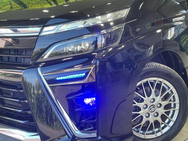 ヴォクシー ハイブリッドＺＳ　煌ＩＩ　両側電動ドア　フリップダウンモニター　１０型ナビ　バックカメラ　衝突軽減装置　禁煙車　前席シートヒーター　ドラレコ　コーナーセンサー　スマートキー　ＬＥＤヘッド　ＥＴＣ　クルコン　オートハイビーム（12枚目）