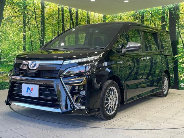 ヴォクシー ハイブリッドＺＳ　煌ＩＩ　両側電動ドア　フリップダウンモニター　１０型ナビ　バックカメラ　衝突軽減装置　禁煙車　前席シートヒーター　ドラレコ　コーナーセンサー　スマートキー　ＬＥＤヘッド　ＥＴＣ　クルコン　オートハイビーム（24枚目）