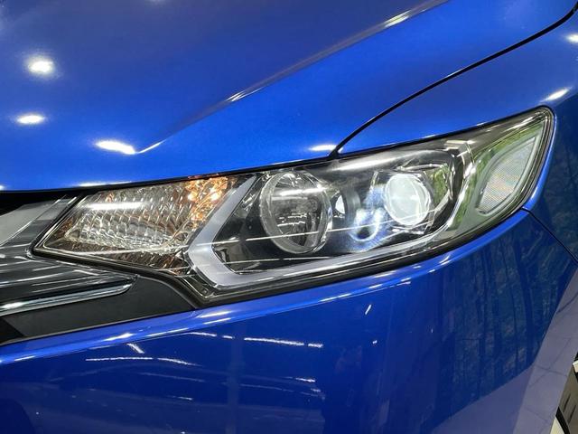 フィットハイブリッド Ｆパッケージ　メーカーナビ　バックカメラ　衝突軽減装置　禁煙車　スマートキー　ＬＥＤヘッド　ＥＴＣ　オートライト　オートエアコン　Ｂｌｕｅｔｏｏｔｈ　ＣＤ　ＤＶＤ再生　フルセグ　ステアリングスイッチ　電動格納ミラー（12枚目）