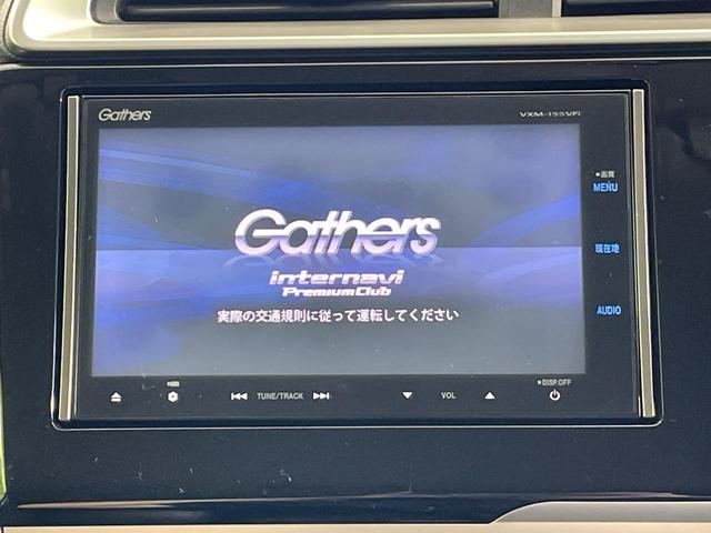 フィットハイブリッド Ｌパッケージ　純正ナビ　バックカメラ　衝突軽減装置　禁煙車　ハーフレザーシート　ドラレコ　スマートキー　ＬＥＤヘッド　ＥＴＣ　クルコン　オートライト　オートエアコン　Ｂｌｕｅｔｏｏｔｈ　ＣＤ　ＤＶＤ再生（3枚目）