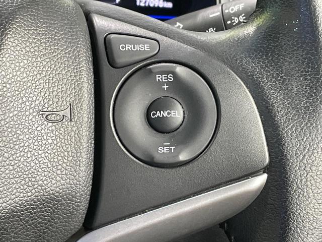 フィットハイブリッド Ｌパッケージ　純正ナビ　バックカメラ　衝突軽減装置　禁煙車　ハーフレザーシート　ドラレコ　スマートキー　ＬＥＤヘッド　ＥＴＣ　クルコン　オートライト　オートエアコン　Ｂｌｕｅｔｏｏｔｈ　ＣＤ　ＤＶＤ再生（7枚目）