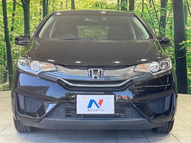 フィットハイブリッド Ｌパッケージ　純正ナビ　バックカメラ　衝突軽減装置　禁煙車　ハーフレザーシート　ドラレコ　スマートキー　ＬＥＤヘッド　ＥＴＣ　クルコン　オートライト　オートエアコン　Ｂｌｕｅｔｏｏｔｈ　ＣＤ　ＤＶＤ再生（14枚目）