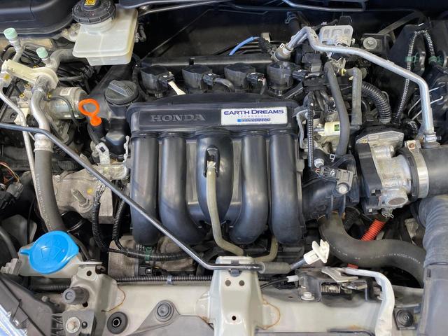 フィットハイブリッド Ｌパッケージ　純正ナビ　バックカメラ　衝突軽減装置　禁煙車　ハーフレザーシート　ドラレコ　スマートキー　ＬＥＤヘッド　ＥＴＣ　クルコン　オートライト　オートエアコン　Ｂｌｕｅｔｏｏｔｈ　ＣＤ　ＤＶＤ再生（18枚目）