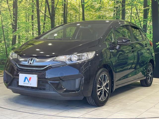 フィットハイブリッド Ｌパッケージ　純正ナビ　バックカメラ　衝突軽減装置　禁煙車　ハーフレザーシート　ドラレコ　スマートキー　ＬＥＤヘッド　ＥＴＣ　クルコン　オートライト　オートエアコン　Ｂｌｕｅｔｏｏｔｈ　ＣＤ　ＤＶＤ再生（24枚目）