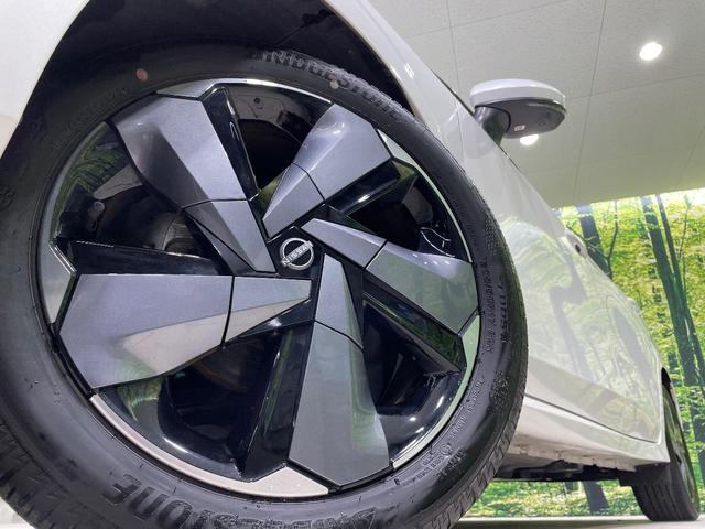 オーラ Ｇ　メーカー９型ナビ　全周囲カメラ　ＢＯＳＥサウンド　衝突軽減装置　プロパイロット　禁煙車　ハーフレザーシート　ドラレコ　コーナーセンサー　スマートキー　ＬＥＤヘッド　ＥＴＣ　純正１７インチアルミ（12枚目）