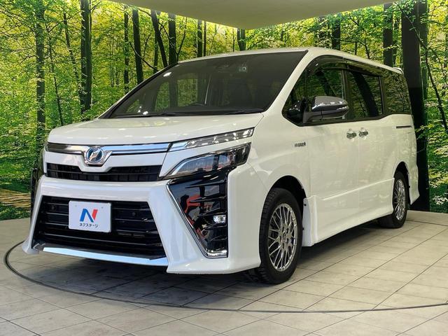 ヴォクシー ハイブリッドＺＳ　煌ＩＩ　両側電動ドア　ＢＩＧＸ９型ナビ　後席モニター　バックカメラ　衝突軽減装置　禁煙車　ドラレコ　コーナーセンサー　スマートキー　ＬＥＤヘッド　ビルトインＥＴＣ　クルコン　純正１６インチアルミ（24枚目）