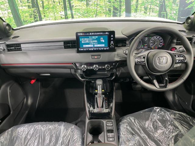 ヴェゼル ｅ：ＨＥＶ　ＲＳ　登録済未使用車　メーカー９型ナビ　全周囲カメラ　衝突軽減装置　電動リアゲート　ハーフレザーシート　コーナーセンサー　スマートキー　ＬＥＤヘッド　ＥＴＣ２．０　純正１８インチアルミ　オートハイビーム（2枚目）