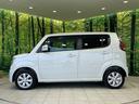 １０ｔｈアニバーサリー　リミテッド　禁煙車　スマートキー　ＨＩＤヘッド　ＥＴＣ　オートライト　オートエアコン　純正１４インチアルミ　ＣＤ再生　革巻きステアリング　ステアリングスイッチ　横滑防止装置　電動格納ミラー　後席格納（25枚目）