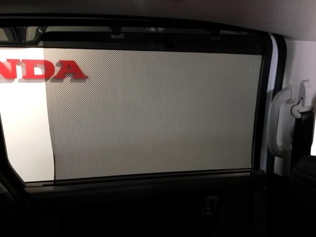 フリード+ハイブリッド ハイブリッドEX メモリーナビ フルセグ リアカメラ ETC 盗難防止システム 衝突軽減システム ウォークスルー オートクルーズコントロール キーレス スマートキ バックカメラ シートH ABS AAC DVD再生(14枚目)