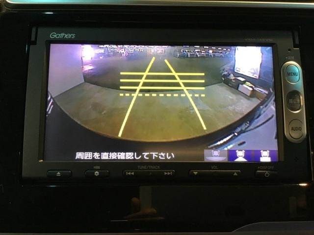 フィットハイブリッド Ｆパッケージ　メモリーナビ　リアカメラ　ＥＴＣ　盗難警報装置　ＡＵＴＯエアコン　助手席エアバック　ＥＣＯＮ　リヤカメラ　ＡＢＳ付　ＤＶＤ視聴　横滑り防止システム　キーレスエントリー　運転席エアバック（19枚目）