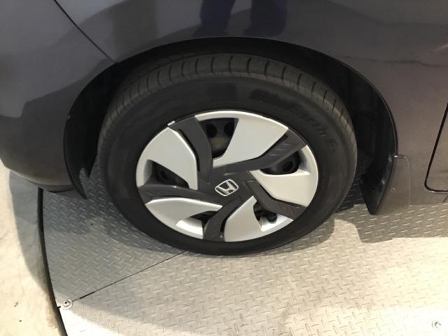 フィットハイブリッド Ｆパッケージ　メモリーナビ　リアカメラ　ＥＴＣ　盗難警報装置　ＡＵＴＯエアコン　助手席エアバック　ＥＣＯＮ　リヤカメラ　ＡＢＳ付　ＤＶＤ視聴　横滑り防止システム　キーレスエントリー　運転席エアバック（28枚目）