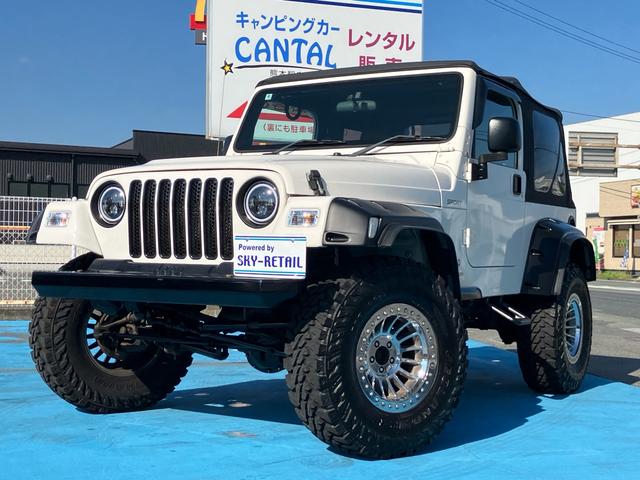ジープ・ラングラー スポーツ　４ＷＤ　社外前後バンパー　社外マフラー　社外オーバーフェンダー　社外１６インチＡＷ　ＥＴＣ（3枚目）