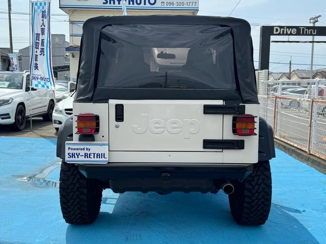 ジープ・ラングラー スポーツ　４ＷＤ　社外前後バンパー　社外マフラー　社外オーバーフェンダー　社外１６インチＡＷ　ＥＴＣ（11枚目）